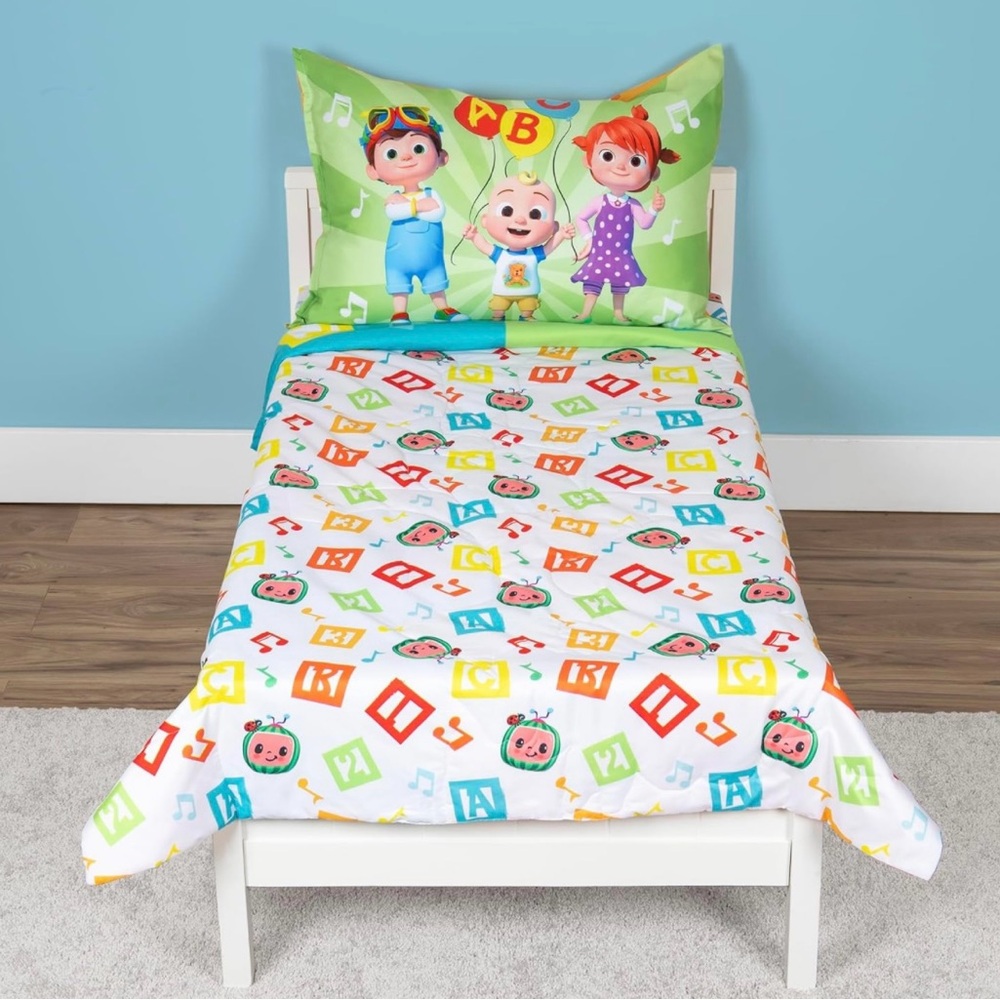 Brand new reversible   Cocomelon 4 pc toddler bed set
